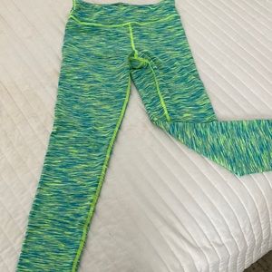 Girls medium leggings. Never worn .